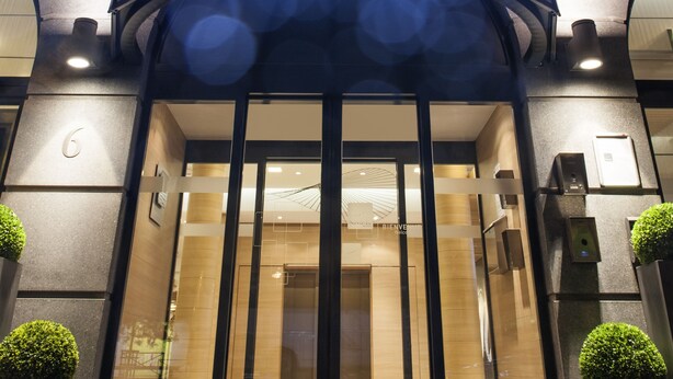 The exterior of a hotel with a prominent 'NOVOTEL' sign. - Novotel Brussels Centre Midi Station (Brussels)