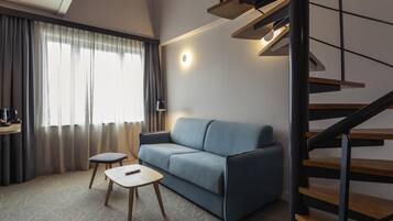 Junior-suite - 1 kingsize-seng | Premium-sengetøj, dundyner, minibar, pengeskab på værelset