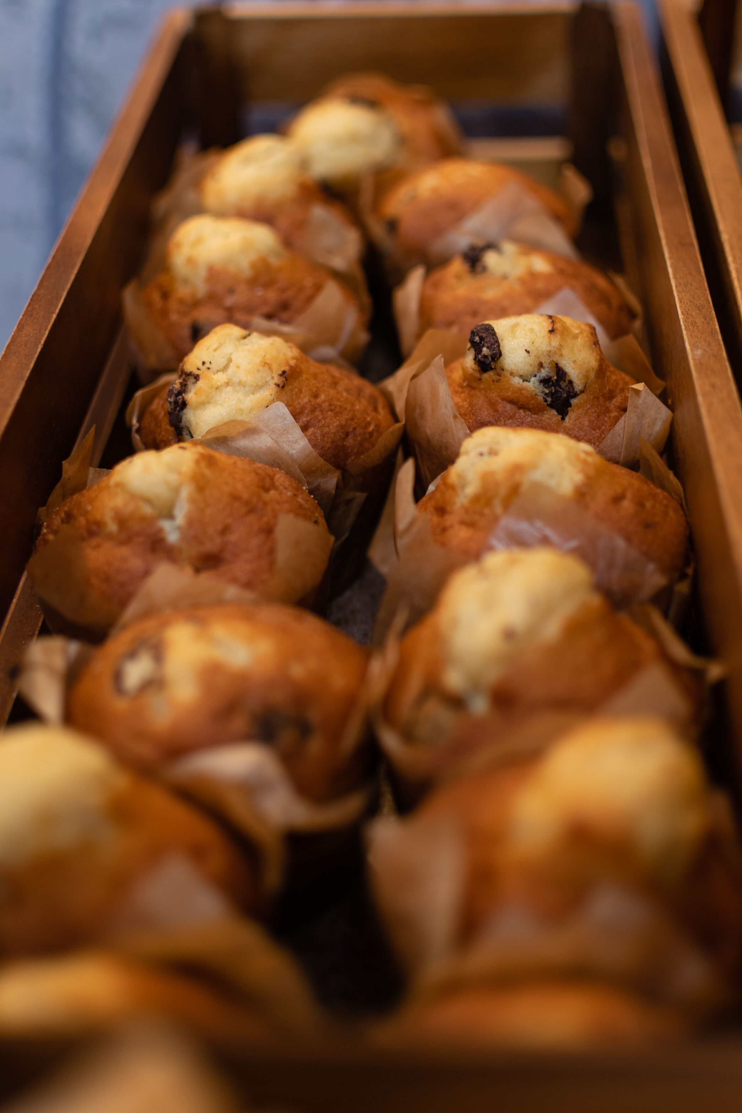 A tray of muffins in a box.