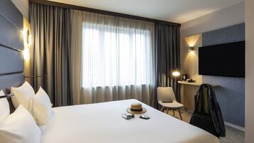 Superior kamer, 1 queensize bed | Luxe beddengoed, donsdekens, een minibar, een kluis op de kamer