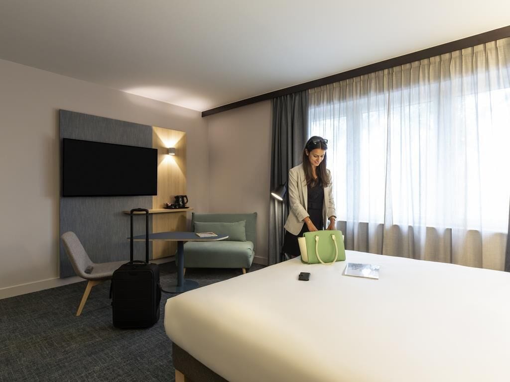 Executive kamer, 1 kingsize bed | Luxe beddengoed, donsdekens, een minibar, een kluis op de kamer