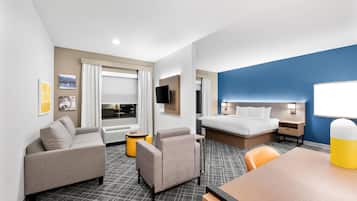 Suite, Multiple Beds, Non Smoking | Desk, laptop workspace, blackout curtains, iron/ironing board