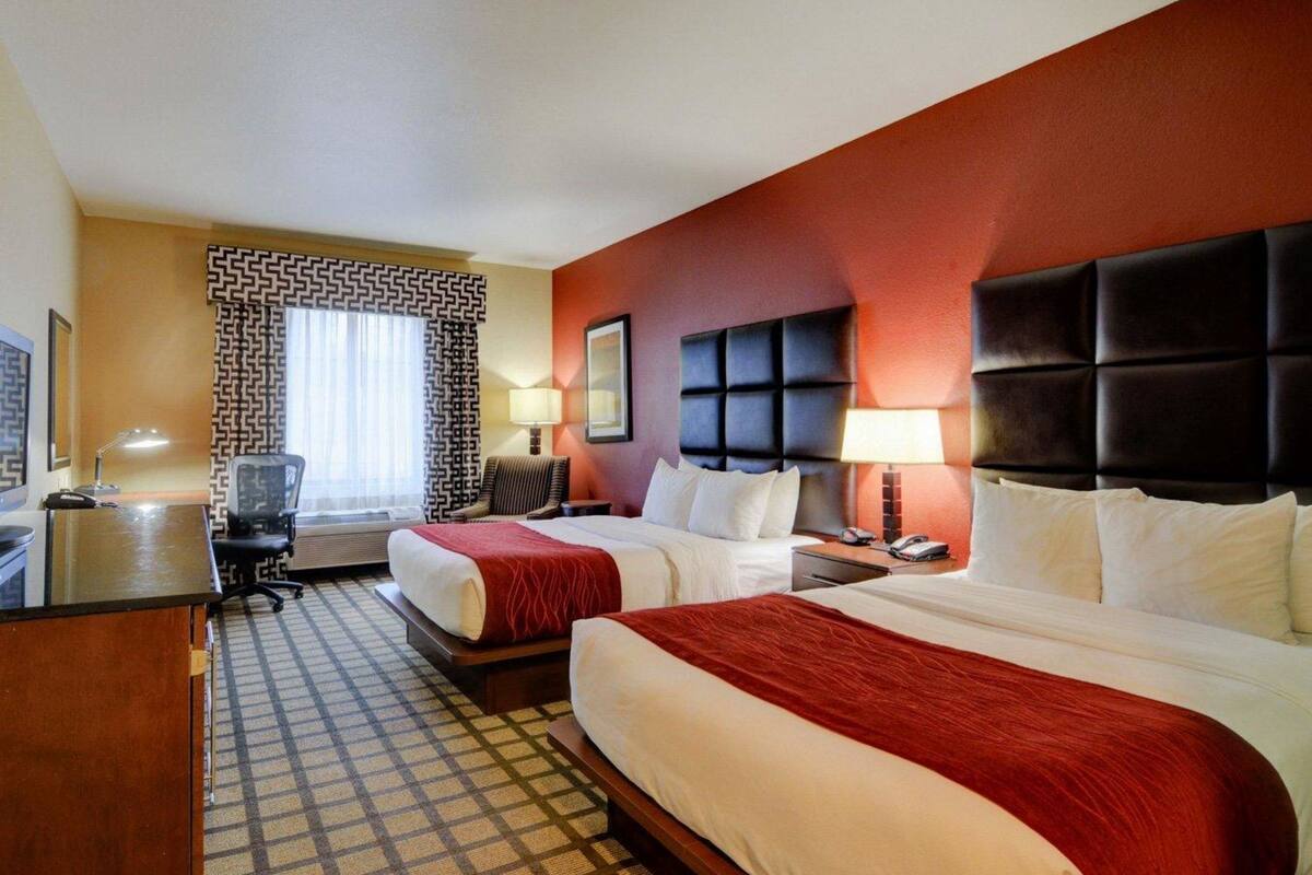 desk, laptop workspace, blackout curtains, iron/ironing board