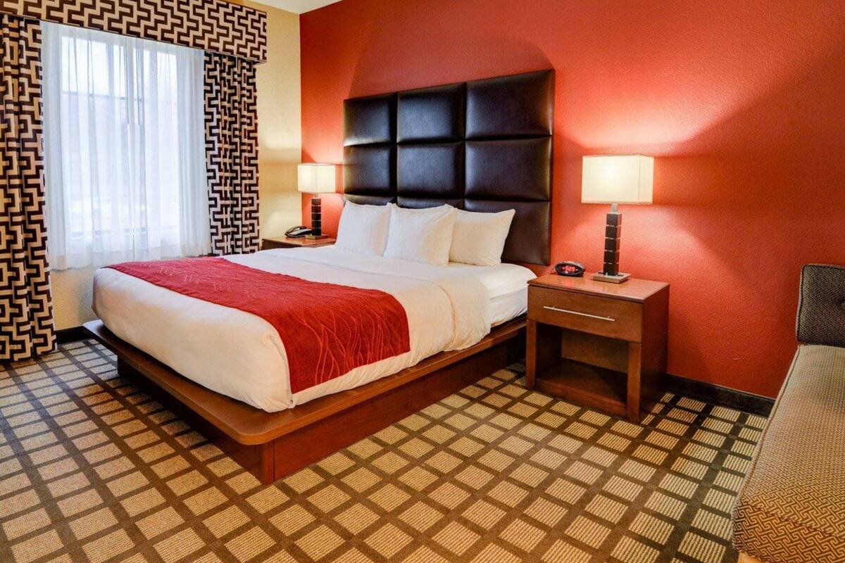 desk, laptop workspace, blackout curtains, iron/ironing board