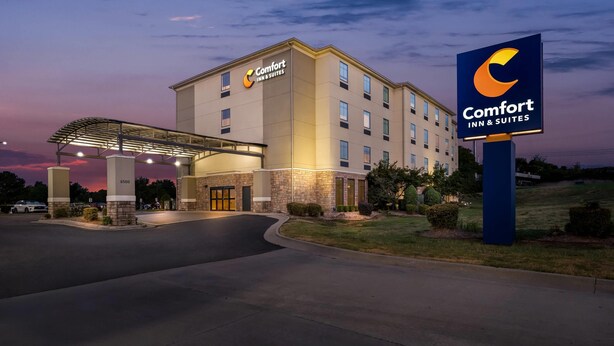 A Comfort Inn & Suites building with a covered entrance and a signboard. - Comfort Inn & Suites Fort Smith I-540 (Fort Smith)