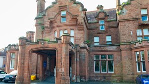 A historic building with a prominent entrance, large windows, and stone construction. - Adamton Country House Hotel (Prestwick)