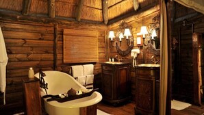 Separate tub and shower, designer toiletries, hair dryer, bathrobes - Selous Serena Camp (Selous Game Reserve)