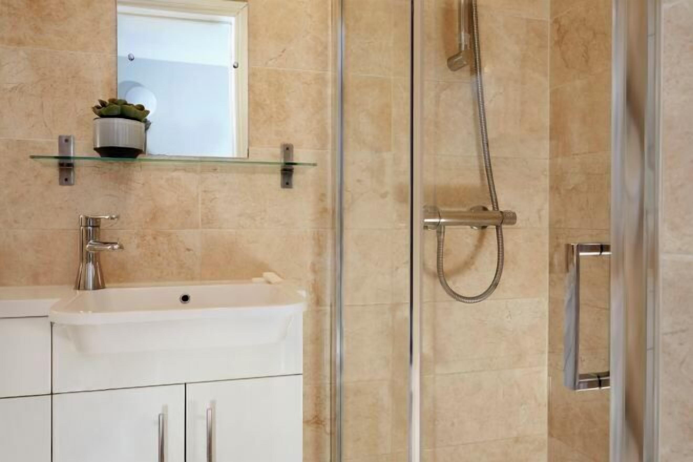 Bathroom | Shower, hair dryer, towels, soap