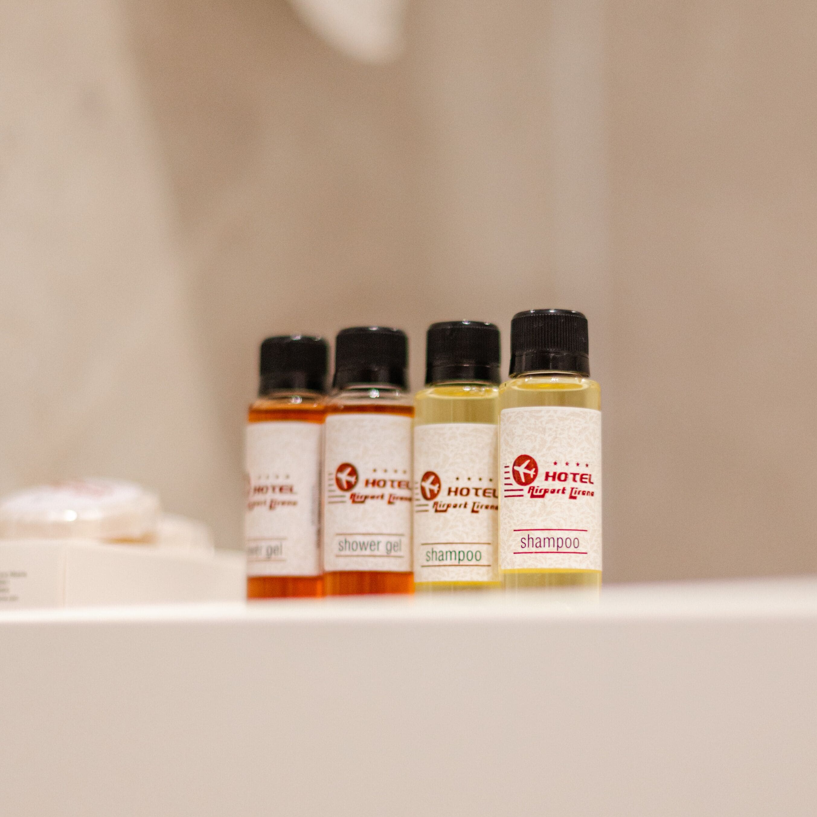 shower, hydromassage showerhead, designer toiletries, hair dryer