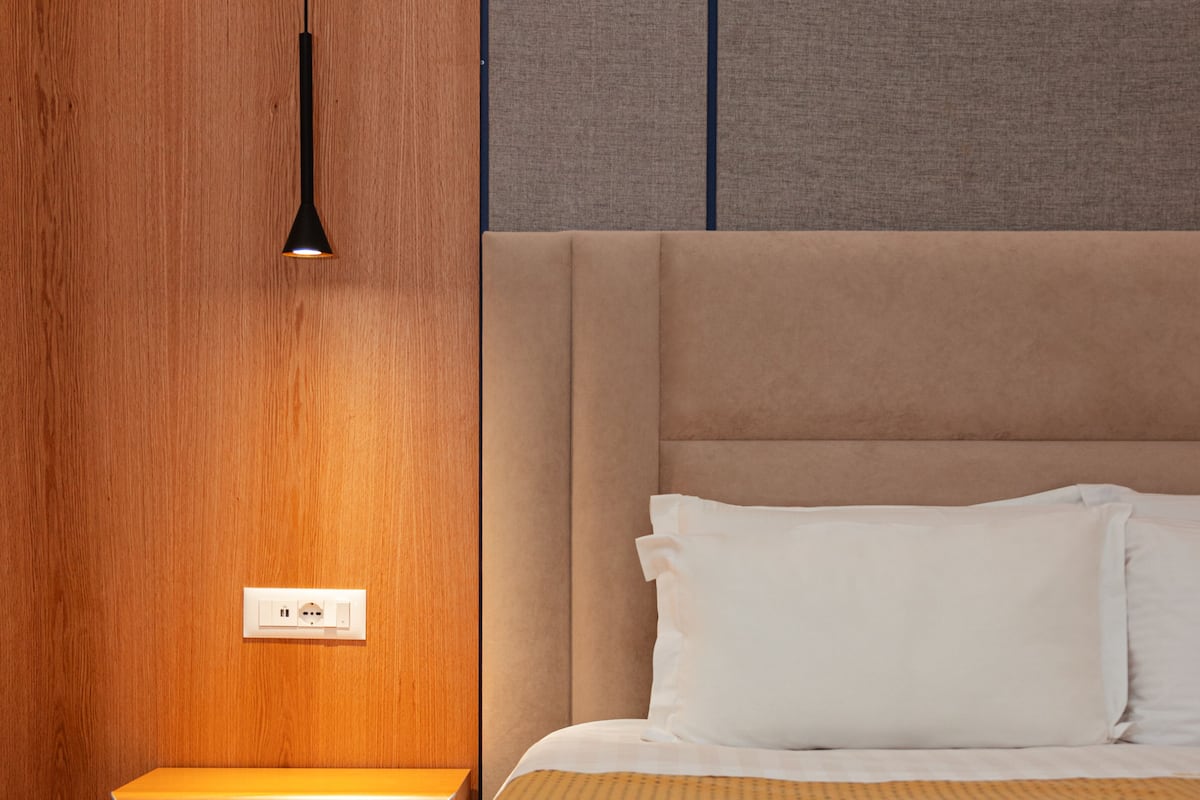 Frette Italian sheets, premium bedding, down duvets, free minibar items