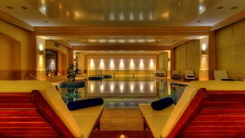 Indoor pool, outdoor pool, pool umbrellas, pool loungers