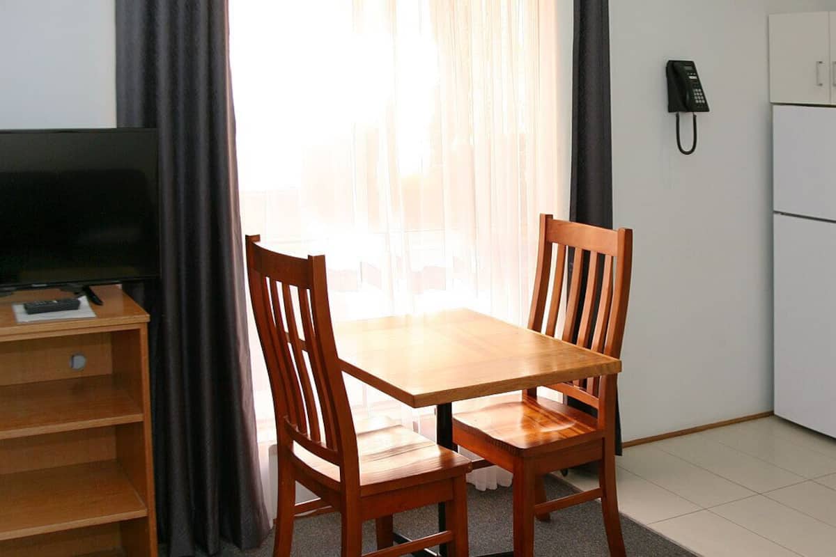 Appartement, 1 slaapkamer | 1 slaapkamer, verduisterende gordijnen, een strijkplank/strijkijzer