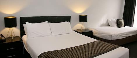 Executive Spa Suite | Blackout drapes, iron/ironing board, bed sheets