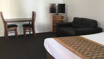One Bedroom Apartment | Blackout curtains, iron/ironing board, bed sheets