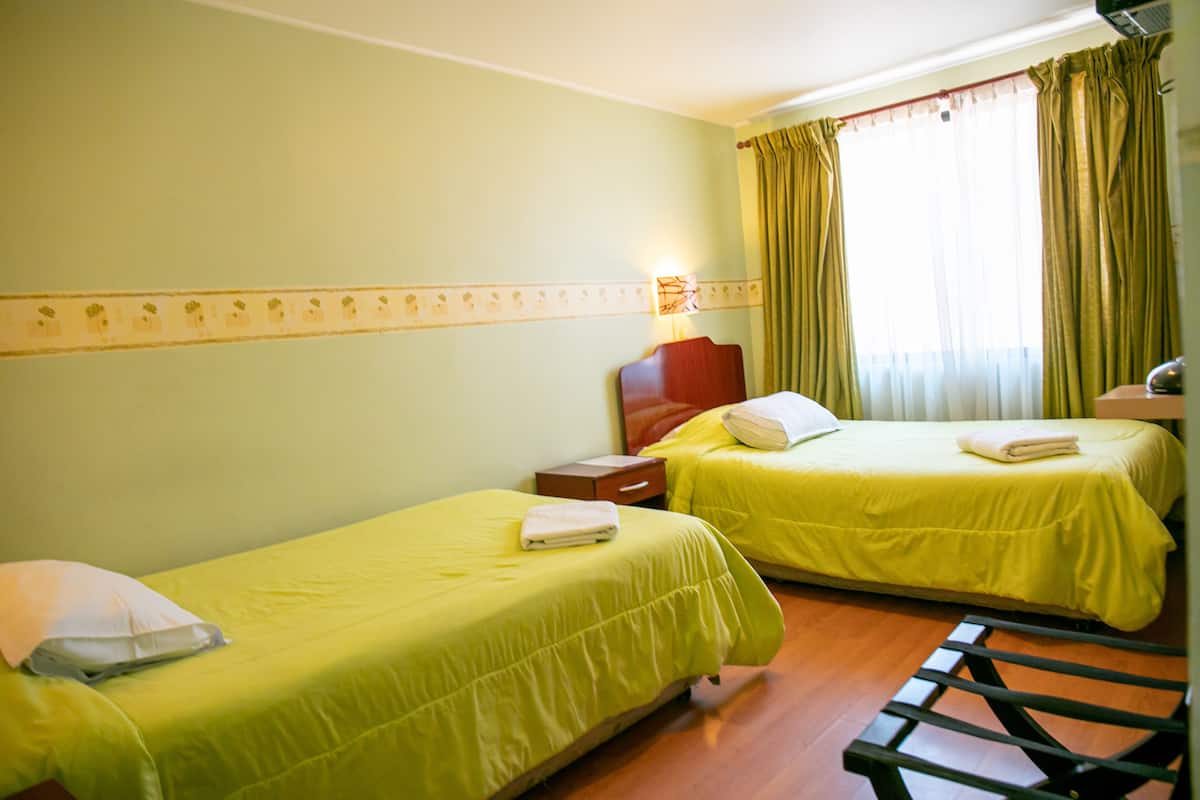 2 habitaciones, minibar y caja de seguridad en la habitación