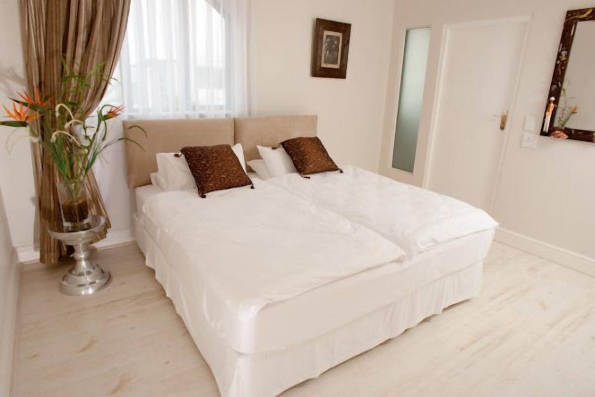 Premium bedding, down duvets, pillow-top beds, in-room safe