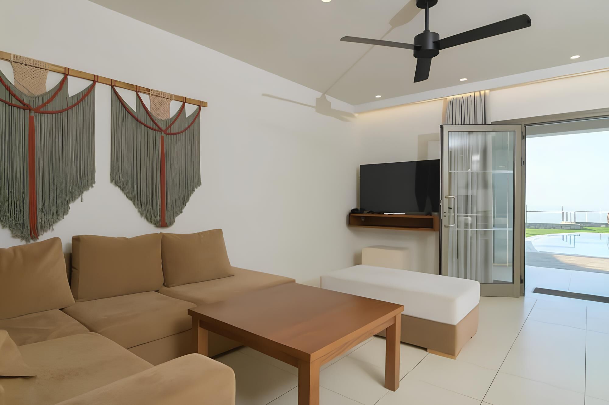 two bedrooms villa with private pool and sea view | living area | 55-inch smart tv with satellite channels