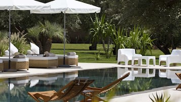 Outdoor pool, pool umbrellas, pool loungers