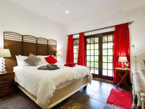 Family Quadruple Room, Garden View | Pillowtop beds, in-room safe, individually decorated, desk - Maputaland Guest House (St. Lucia)