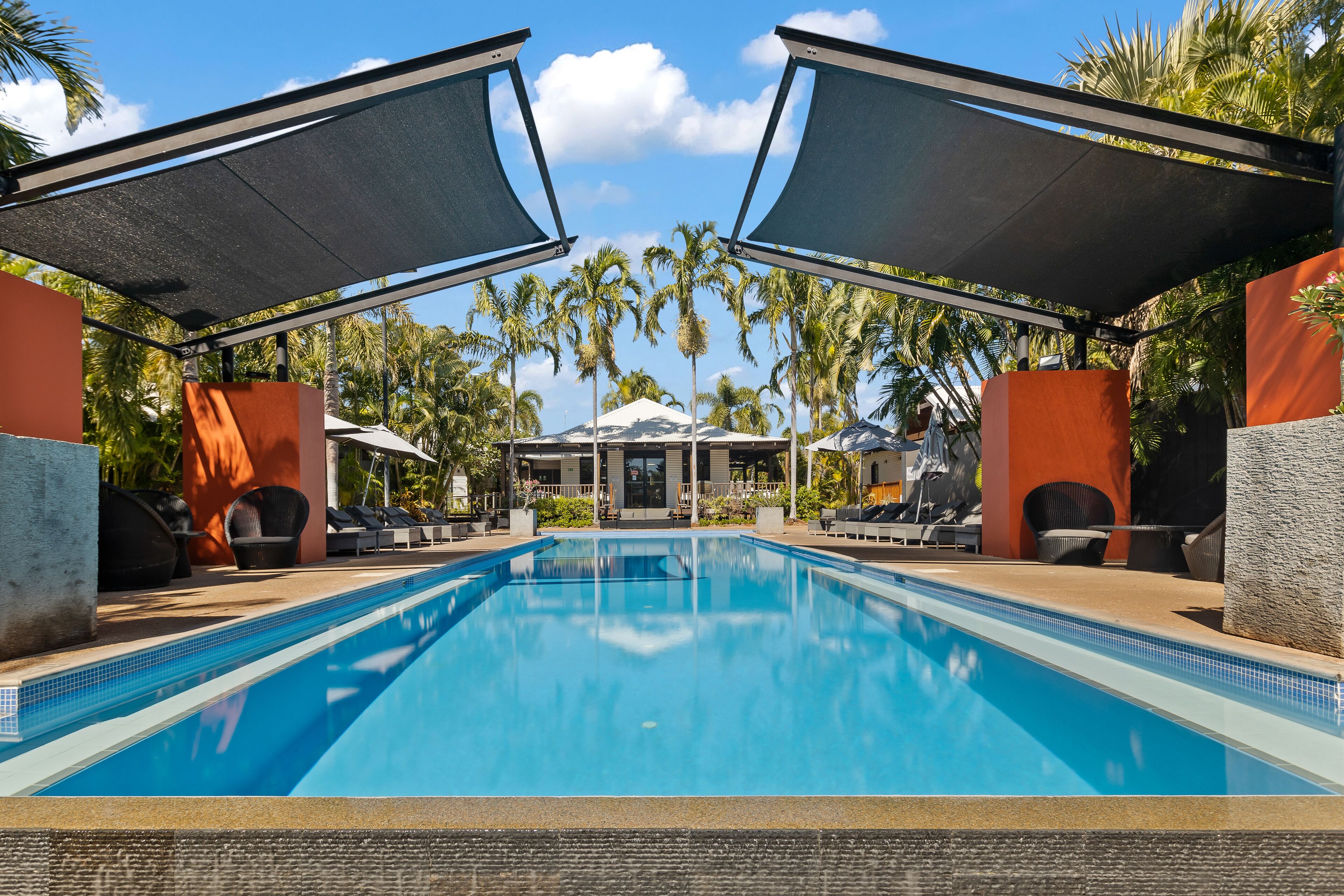 Outdoor pool, pool umbrellas, sun loungers