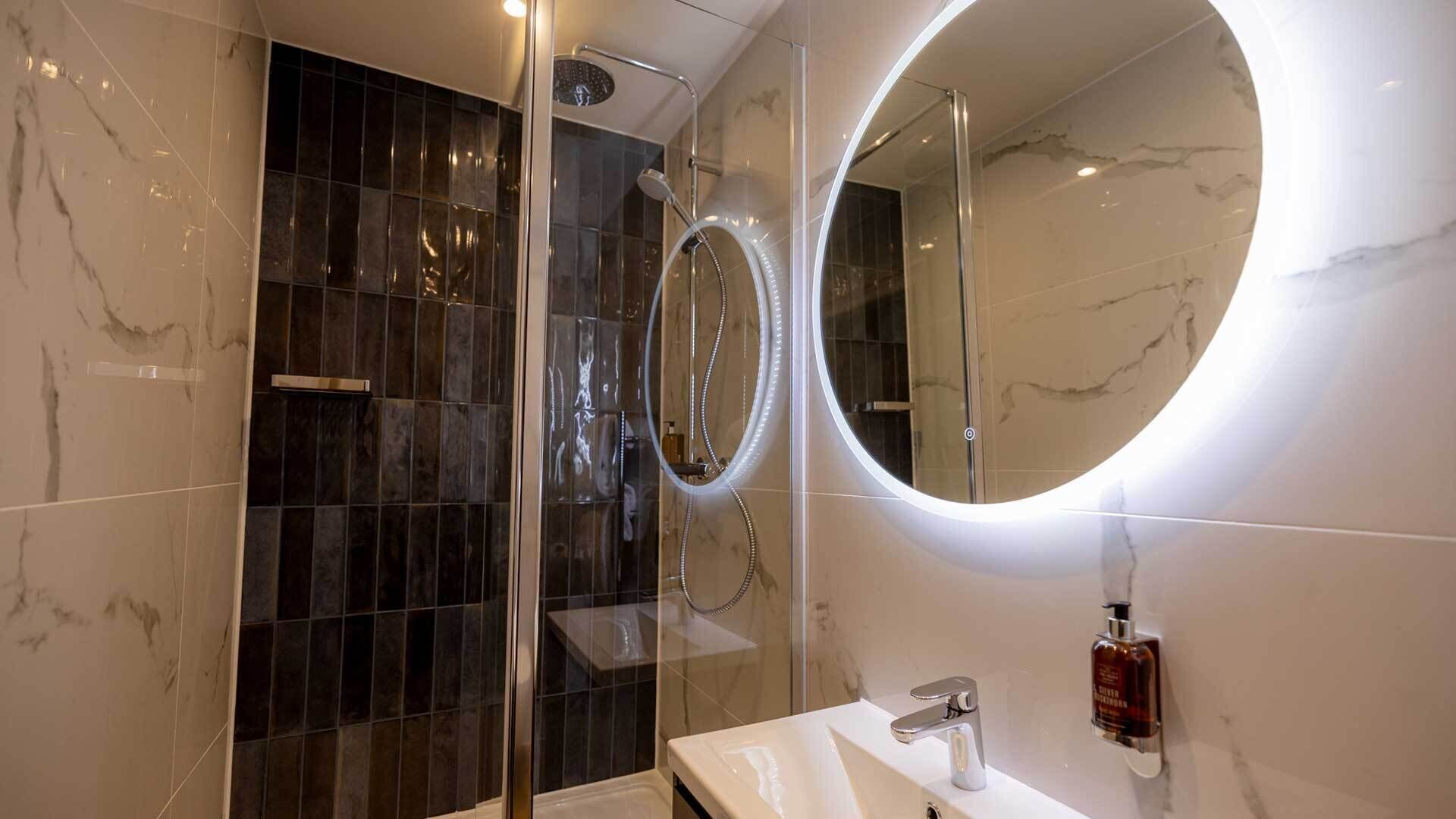 classic double room (limited view) | bathroom | shower, hair dryer, towels