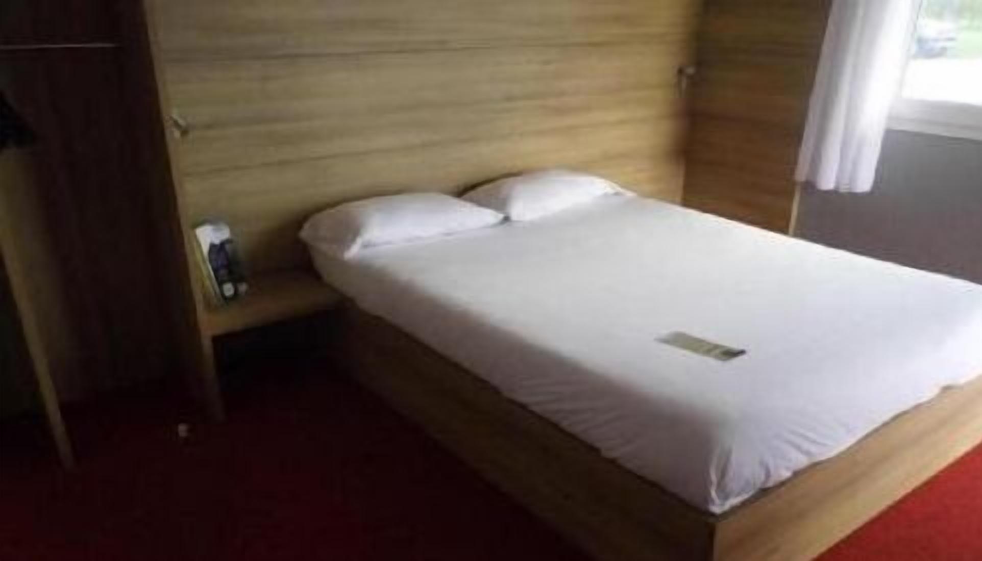 premium bedding, desk, laptop workspace, iron/ironing board