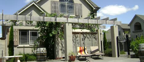 Seasonal outdoor pool, open 7:30 AM to 9:30 PM, pool loungers