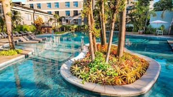 Outdoor pool, open 9:00 AM to 9:00 PM, pool umbrellas, pool loungers
