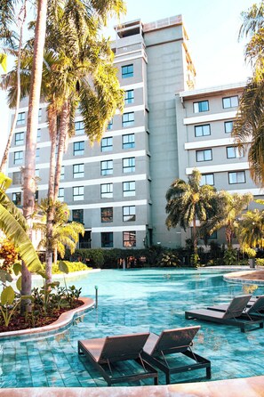 Outdoor pool, open 9:00 AM to 9:00 PM, pool umbrellas, sun loungers