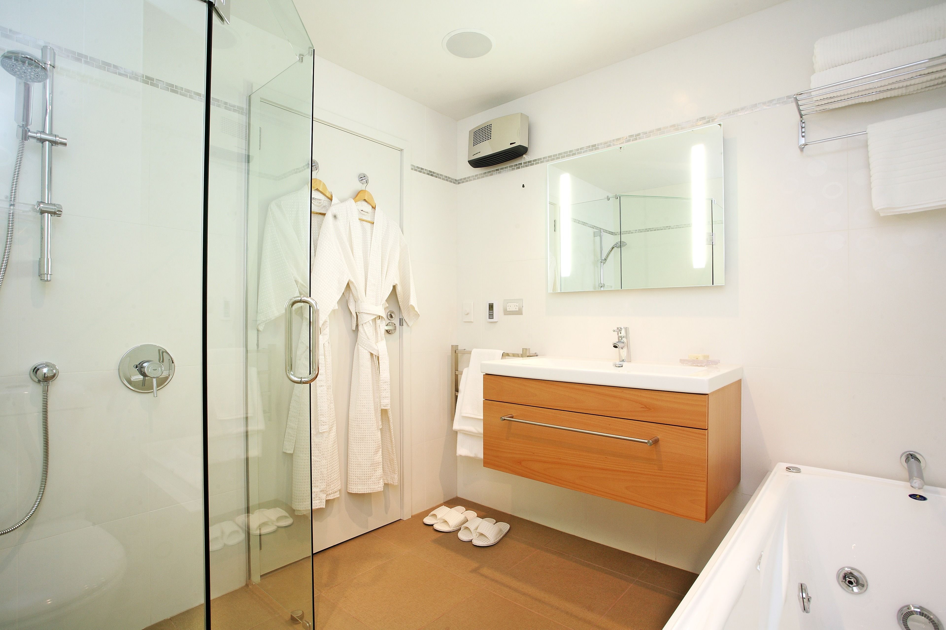 luxury ocean view suite | bathroom | free toiletries, hair dryer, bathrobes, towels
