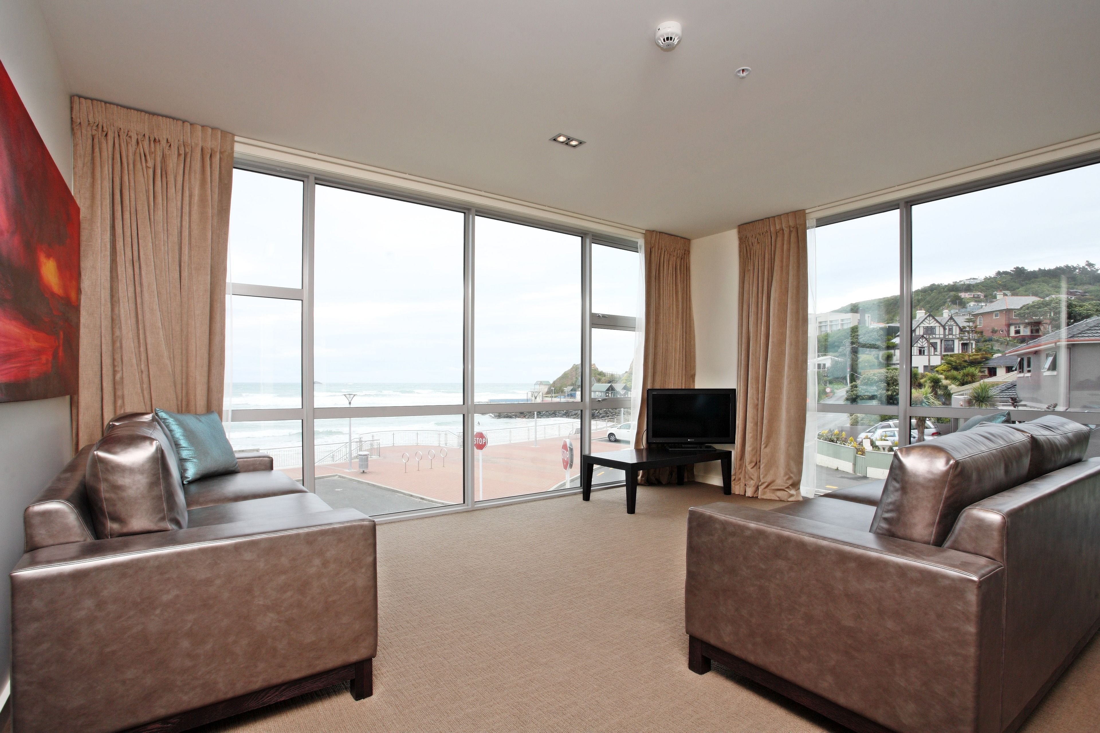 럭셔리 스위트, 바다 전망 | 거실 공간 | LCD TV