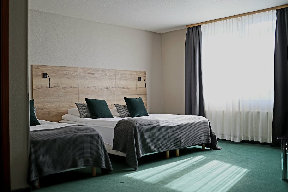 comfort quadruple room | 1 bedroom, desk, laptop workspace, blackout curtains