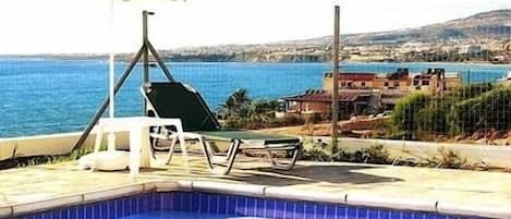 Outdoor pool, pool umbrellas, pool loungers