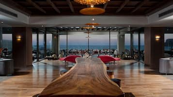 3 bars/lounges, poolside bar, beach bar