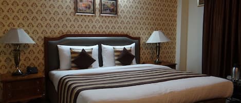 Premium bedding, in-room safe, desk, soundproofing