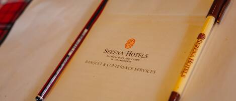 A brochure for Serena Hotels, highlighting their safari lodges, camps, and banquet & conference services.