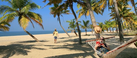 On the beach, beach towels, fishing