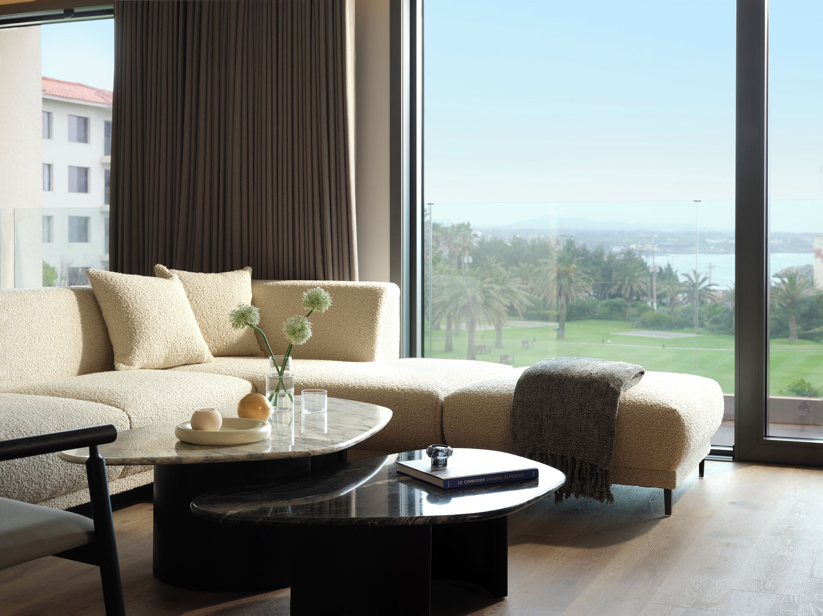 [resort] master suite ocean | living area | 42-inch led tv with satellite channels, tv, ping pong