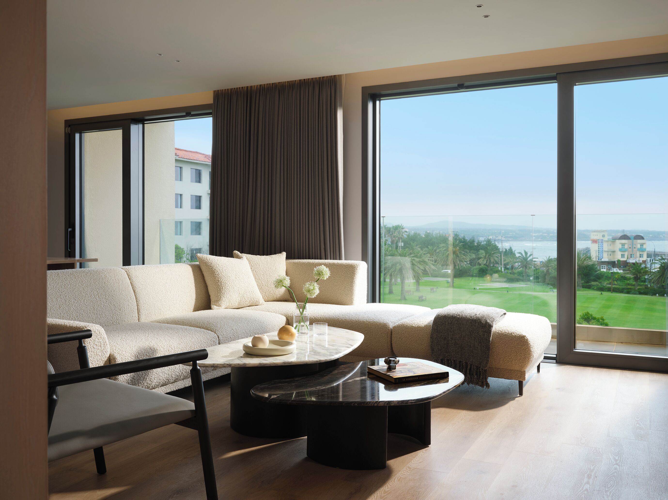 [resort] master suite ocean | living area | 42-inch led tv with satellite channels, tv, ping pong