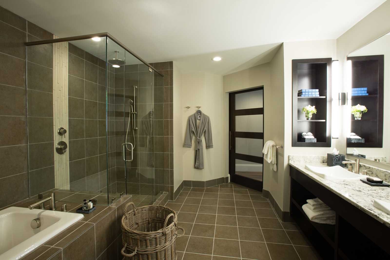 signature suite | bathroom | hair dryer, bathrobes, slippers, towels