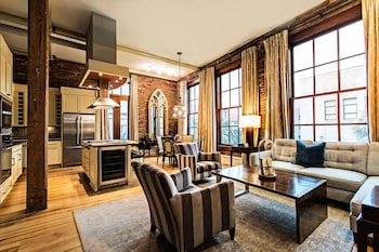 Egyptian cotton sheets, premium bedding, pillowtop beds, minibar at The Restoration