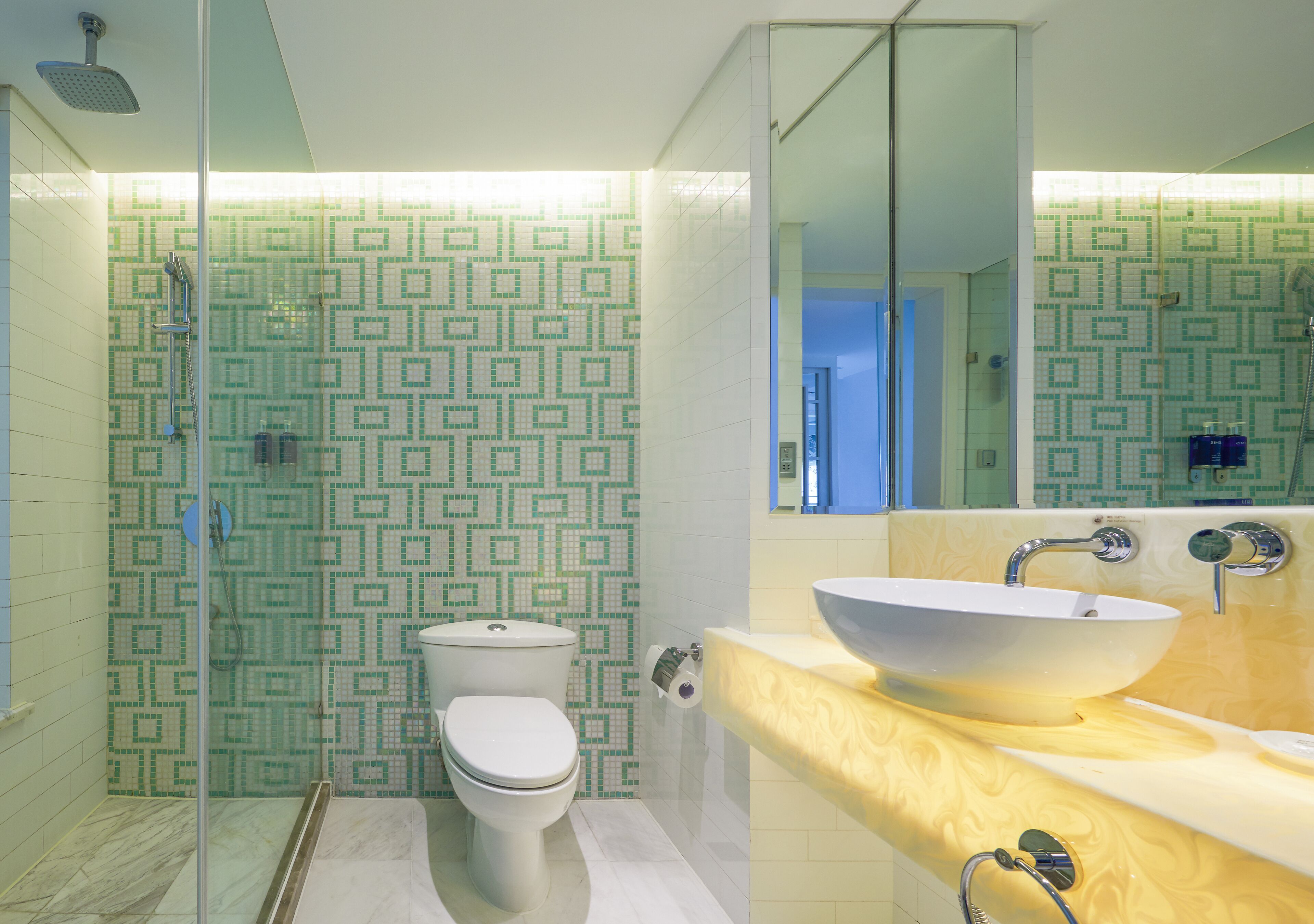 deep-soaking bathtub, rainfall showerhead, free toiletries, hair dryer