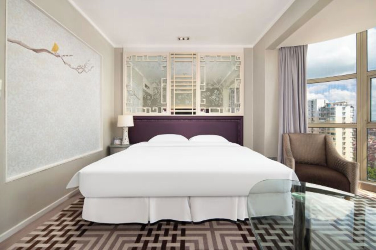 Down comforters, Select Comfort beds, in-room safe, blackout drapes