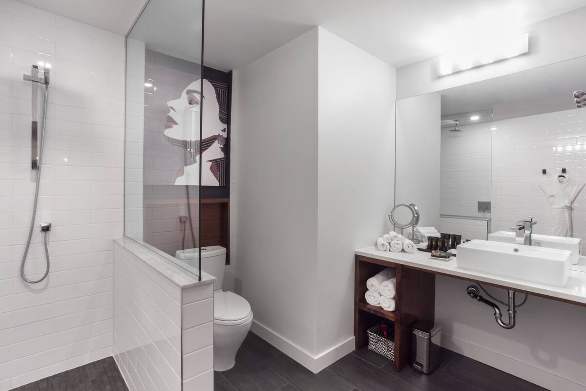 marvellous room, 2 double beds, courtyard view | bathroom | designer toiletries, hair dryer, bathrobes, towels