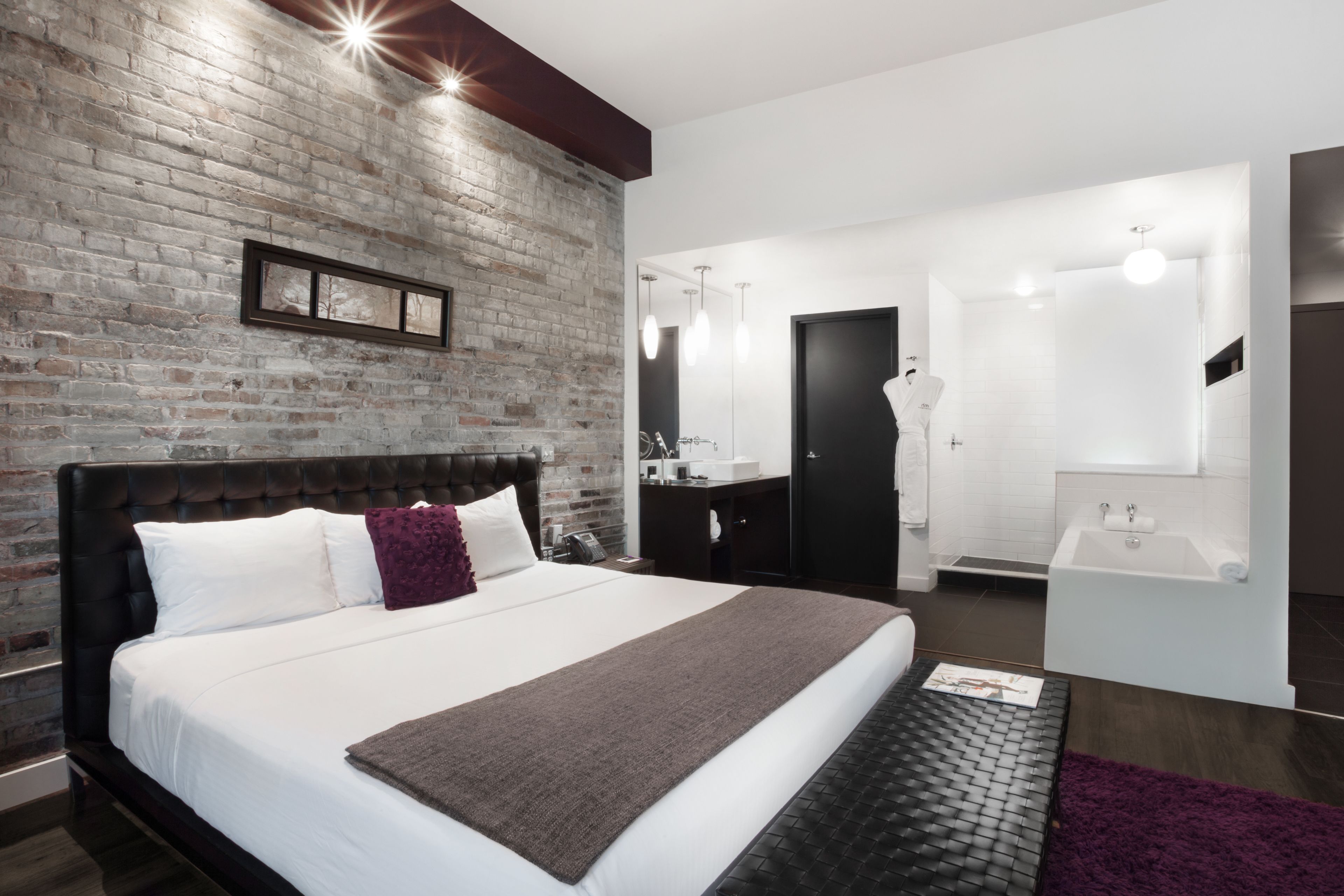 loft, 1 king bed, bathtub, city view | premium bedding, pillow-top beds, in-room safe, individually decorated