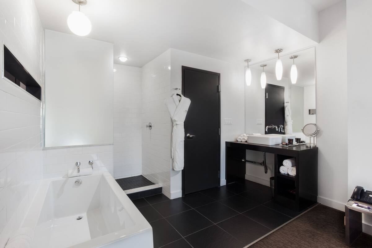 marvellous room, 1 queen bed, city view or courtyard view | bathroom | designer toiletries, hair dryer, bathrobes, towels