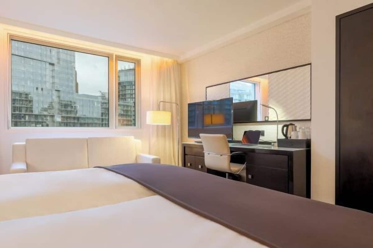 1 habitación, ropa de cama de alta calidad y minibar