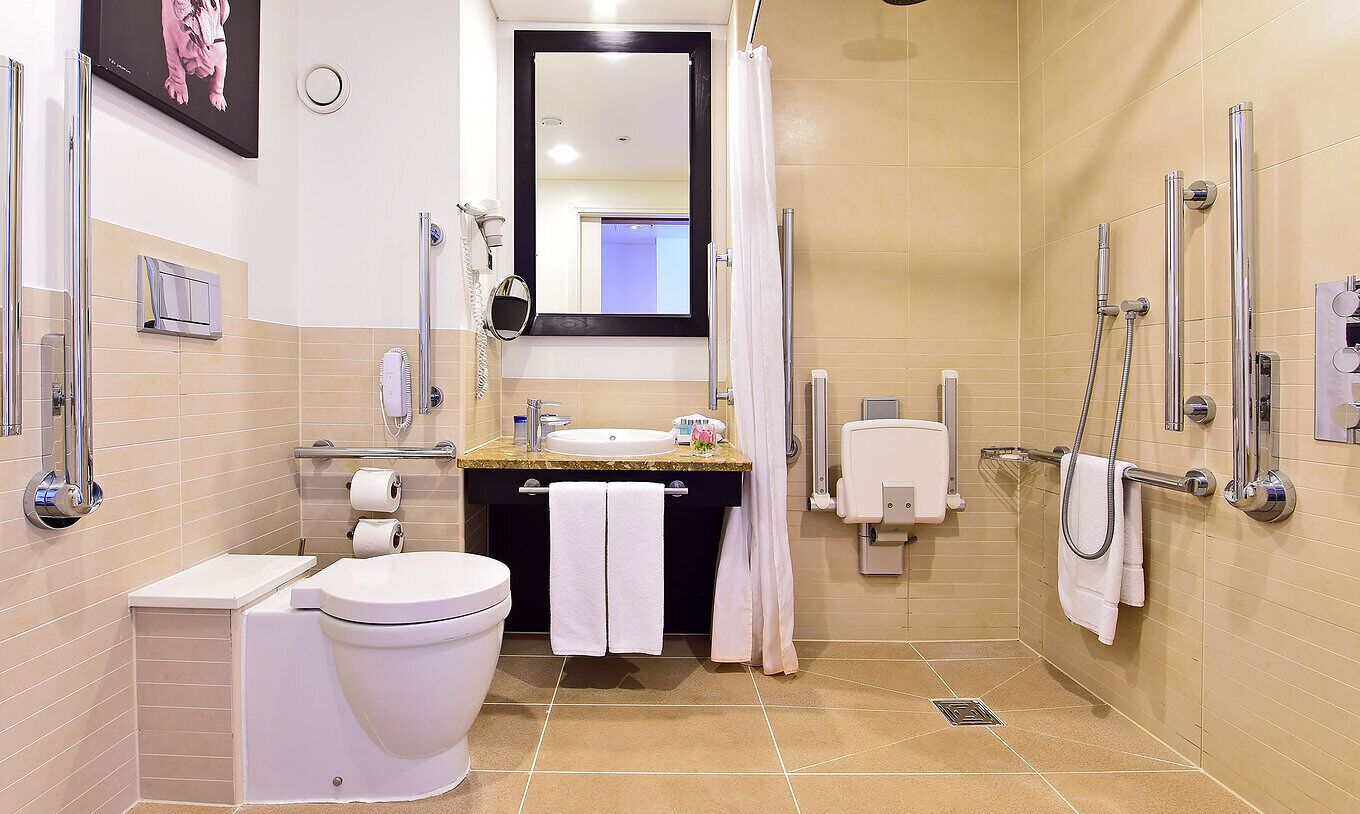 twin room, accessible | bathroom | separate bathtub and shower, free toiletries, hair dryer, bathrobes