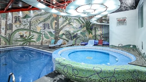Indoor pool, open 9:30 AM to 6:00 PM, pool loungers
