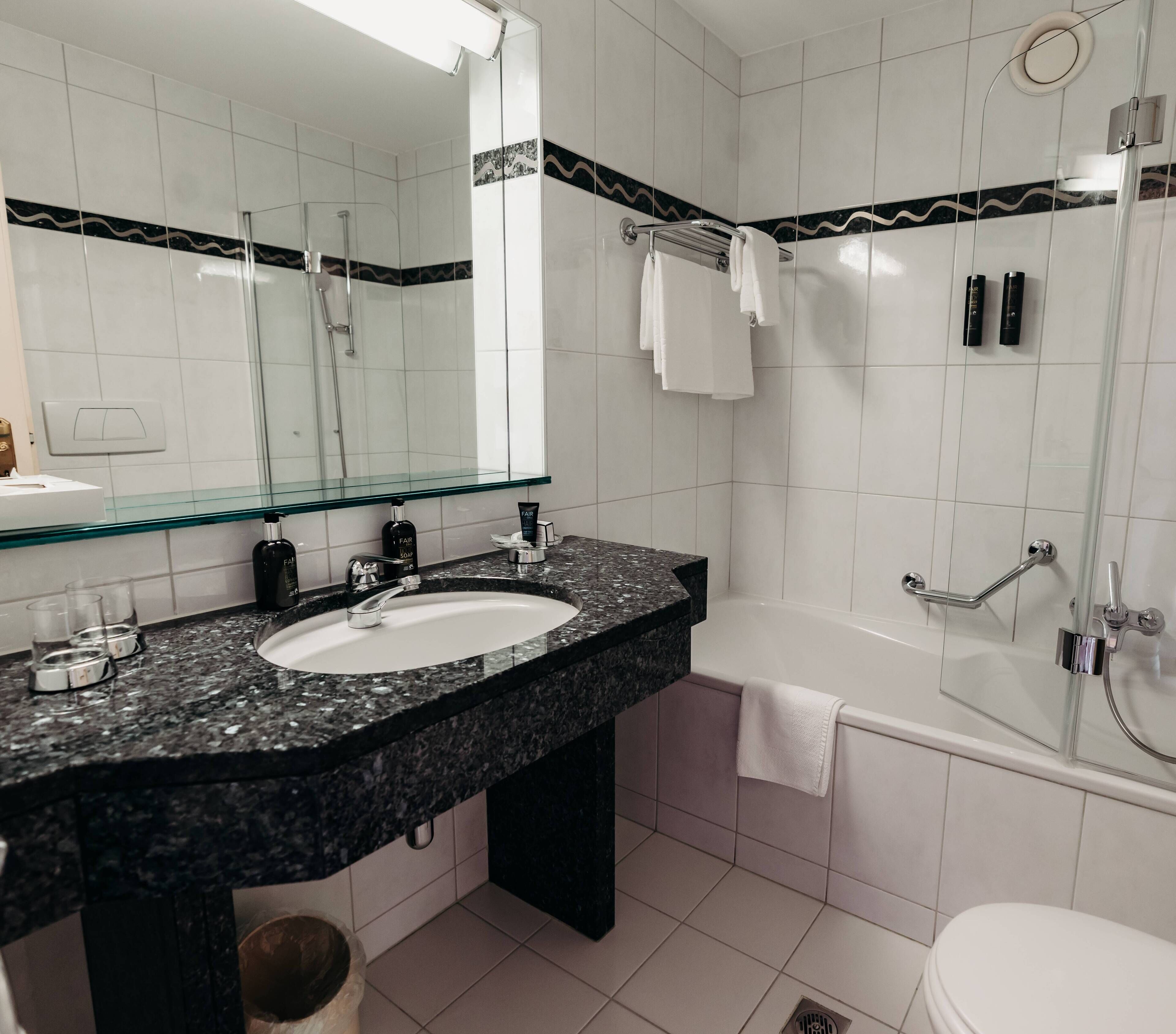 standard double room | bathroom | hair dryer, dressing gowns, slippers, towels